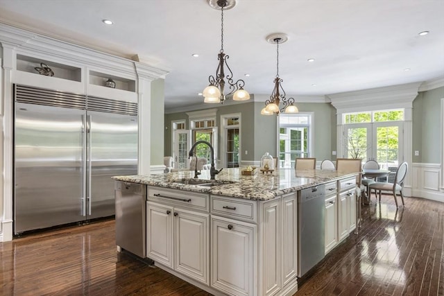 3 Newton Ln, Medway, MA 02053 - kitchen featuring stainless steel appliances, a sink, crown molding, a chandelier, and dark wood finished floors