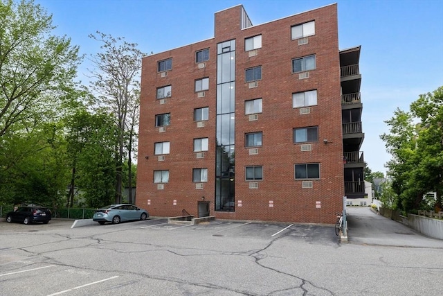 12 Pond Ln Unit 65, Arlington, MA 02474 - view of property with uncovered parking