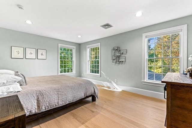 bedroom featuring light hardwood / wood-style flooring