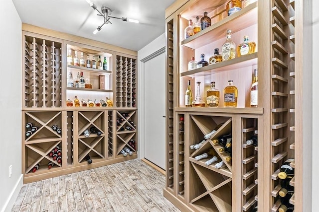 wine room featuring hardwood / wood-style floors