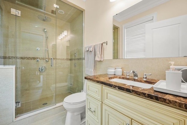 615 E 6th St Unit 6, Boston, MA 02127 - bathroom featuring vanity, toilet, a shower stall, and crown molding