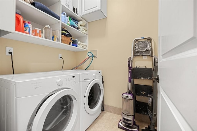 615 E 6th St Unit 6, Boston, MA 02127 - laundry room featuring separate washer and dryer, light tile patterned flooring, and cabinet space
