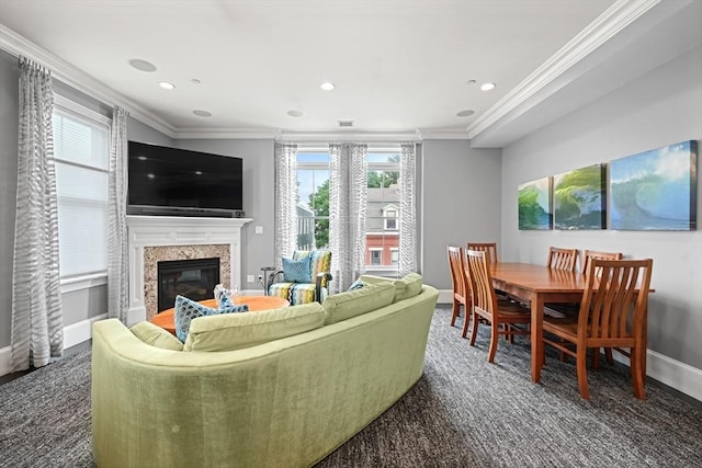 615 E 6th St Unit 6, Boston, MA 02127 - living area featuring ornamental molding, baseboards, a high end fireplace, recessed lighting, and dark colored carpet