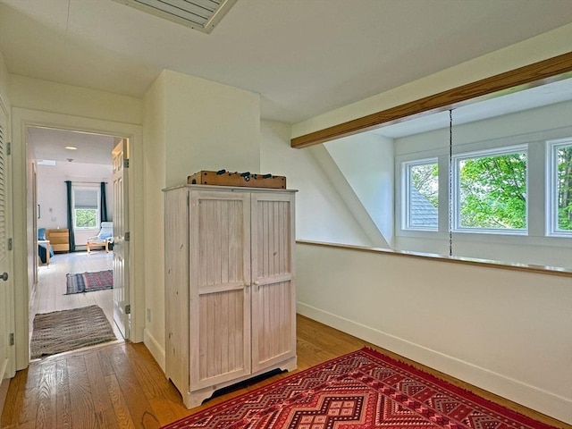 187 Plain Rd, Greenfield, MA 01301 - additional living space featuring light wood-style flooring, baseboards, and beam ceiling