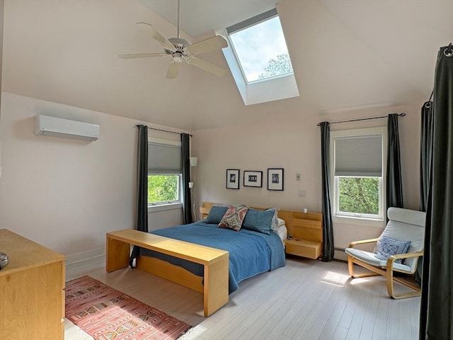 187 Plain Rd, Greenfield, MA 01301 - bedroom featuring a wall unit AC, a skylight, high vaulted ceiling, multiple windows, and light wood-style flooring