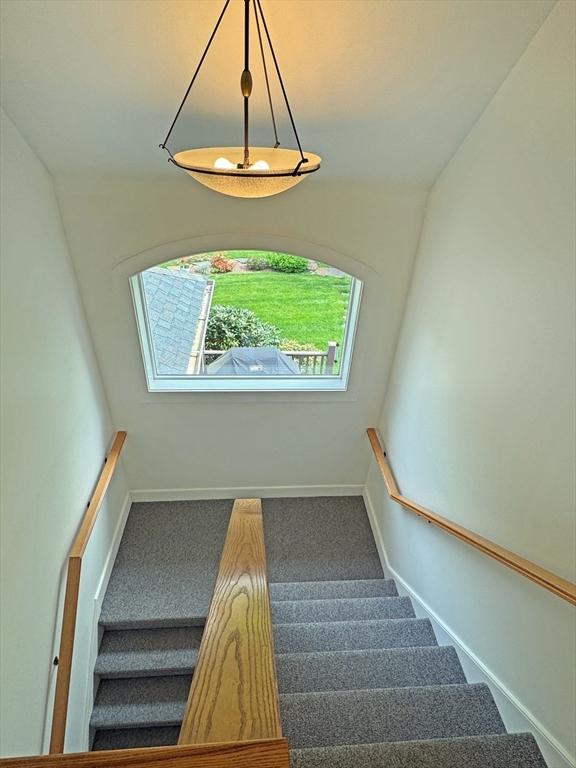 187 Plain Rd, Greenfield, MA 01301 - staircase with carpet and baseboards