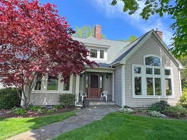187 Plain Rd, Greenfield, MA 01301 - view of front of home with a chimney and a front yard