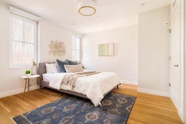 bedroom featuring wood-type flooring