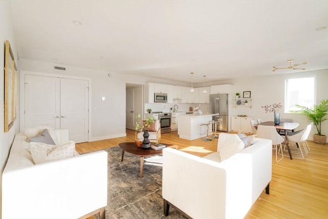 living room featuring light hardwood / wood-style floors