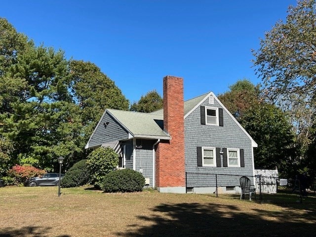 exterior space featuring a lawn