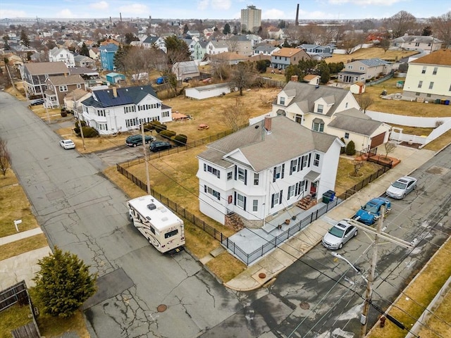 birds eye view of property with a residential view