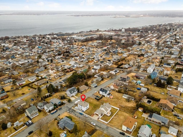 aerial view with a residential view and a water view