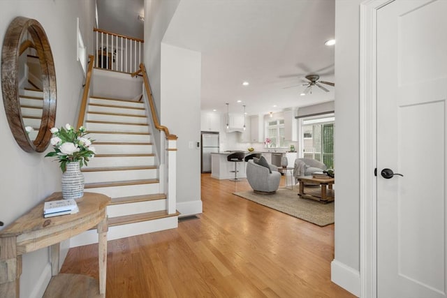 15 Boydes Xing Unit 13, Norfolk, MA 02056 - stairs with wood finished floors, ceiling fan, baseboards, and recessed lighting