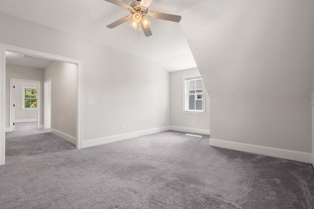 15 Boydes Xing Unit 13, Norfolk, MA 02056 - unfurnished room with carpet, vaulted ceiling, baseboards, and a ceiling fan