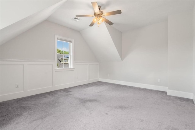 15 Boydes Xing Unit 13, Norfolk, MA 02056 - bonus room with carpet, vaulted ceiling, a ceiling fan, and wainscoting