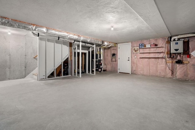 15 Boydes Xing Unit 13, Norfolk, MA 02056 - unfinished basement with water heater, heating unit, and stairway