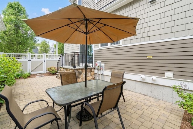 15 Boydes Xing Unit 13, Norfolk, MA 02056 - view of patio / terrace featuring a gate and outdoor dining area
