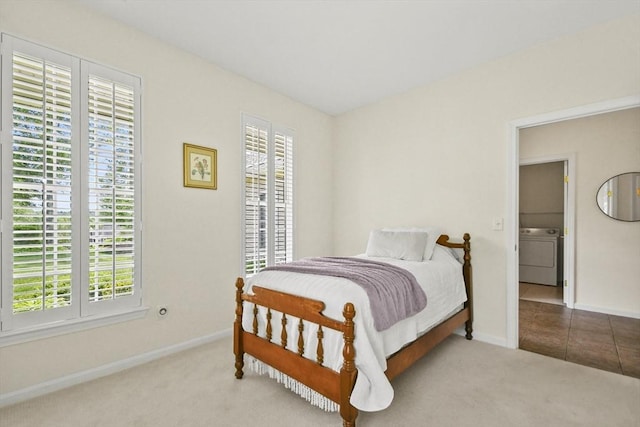 28 Summerfield Dr Unit 28, Grafton, MA 01560 - bedroom featuring washer / dryer, multiple windows, carpet flooring, and baseboards