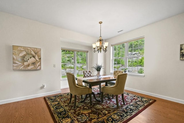 28 Summerfield Dr Unit 28, Grafton, MA 01560 - dining room featuring a chandelier, baseboards, and healthy amount of natural light