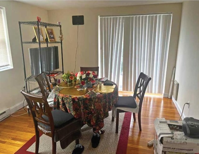 447 Pleasant St, Melrose, MA 02176 - dining room with healthy amount of natural light, wood finished floors, and baseboards