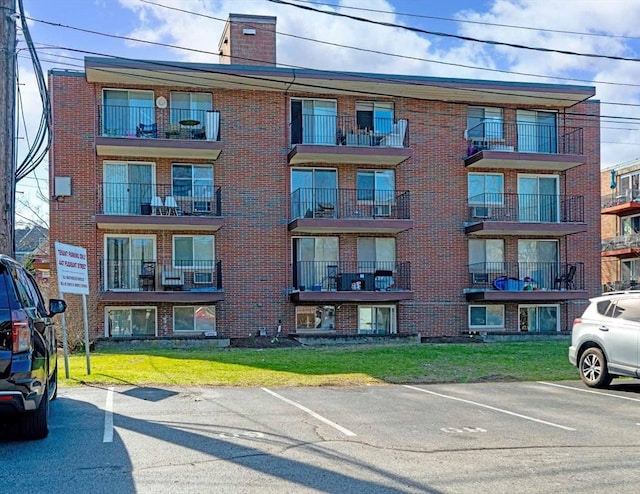 447 Pleasant St, Melrose, MA 02176 - view of apartment building / complex with uncovered parking