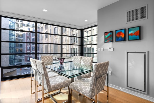 dining room featuring hardwood / wood-style flooring