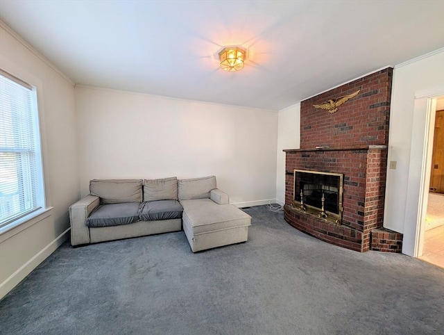 carpeted living room with crown molding and a brick fireplace