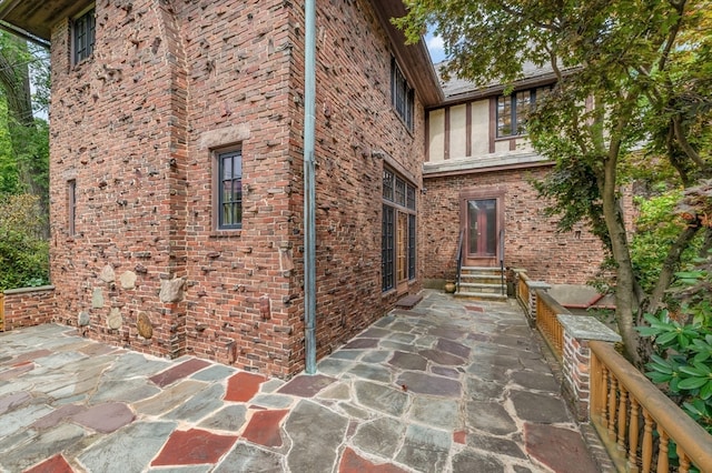 view of home's exterior with a patio area