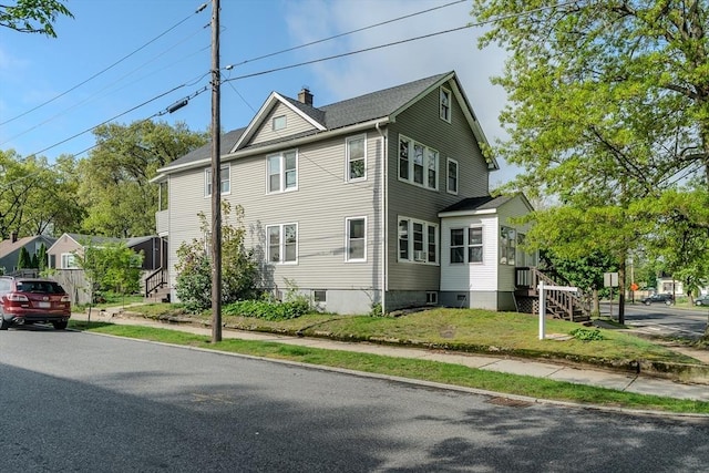 229 Saint James Blvd, Springfield, MA 01104 - view of home's exterior featuring a chimney and stairs