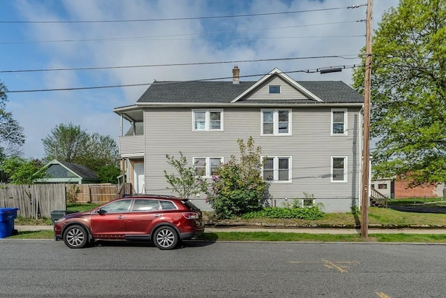 229 Saint James Blvd, Springfield, MA 01104 - traditional home featuring fence and a chimney