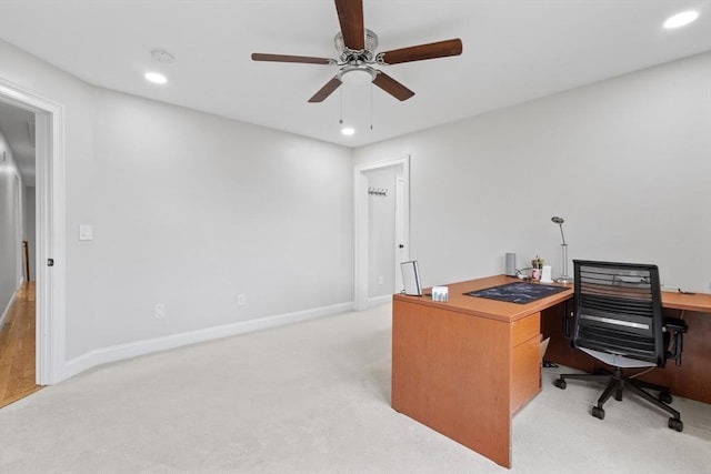 office with baseboards, a ceiling fan, recessed lighting, and light colored carpet