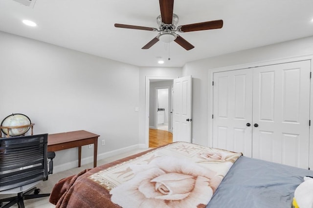 carpeted bedroom featuring recessed lighting, a ceiling fan, baseboards, and a closet
