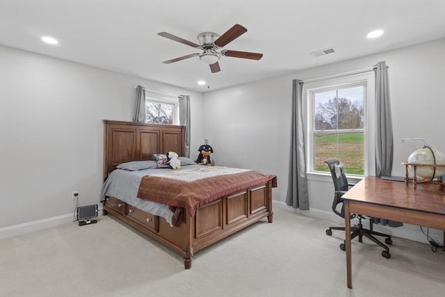 bedroom with visible vents, recessed lighting, baseboards, and light colored carpet