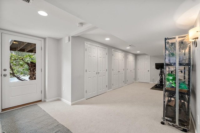 workout room with baseboards, carpet, and recessed lighting