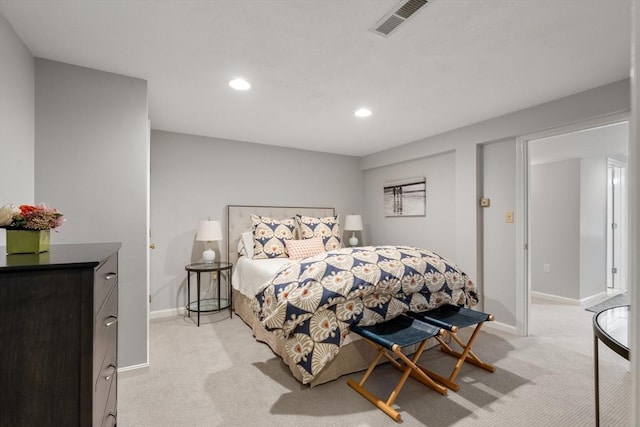 bedroom with light carpet, visible vents, baseboards, and recessed lighting