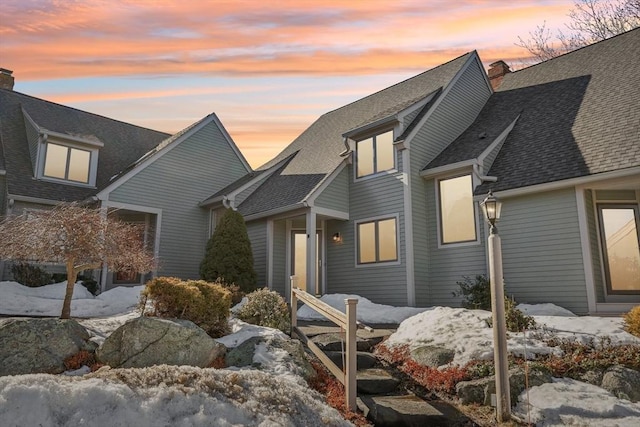 view of front of house featuring a shingled roof