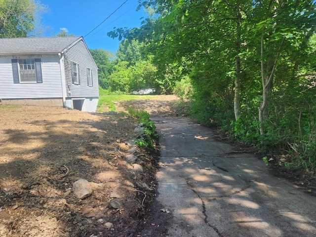 192 White St, Lunenburg, MA 01462 - view of side of home with a shingled roof