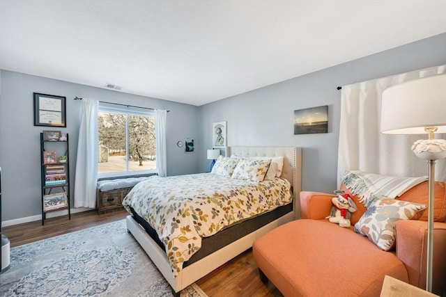 bedroom featuring hardwood / wood-style flooring