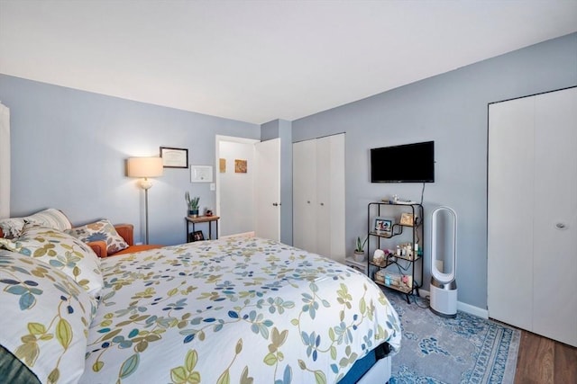 bedroom featuring dark hardwood / wood-style flooring