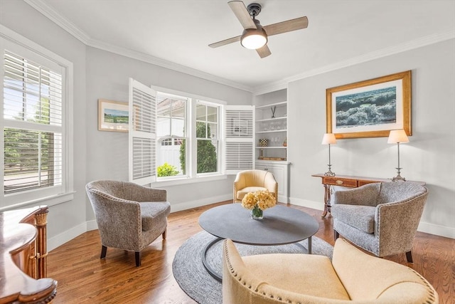 29 Flat Pond Cir, Mashpee, MA 02649 - living area with wood finished floors, ceiling fan, baseboards, and ornamental molding