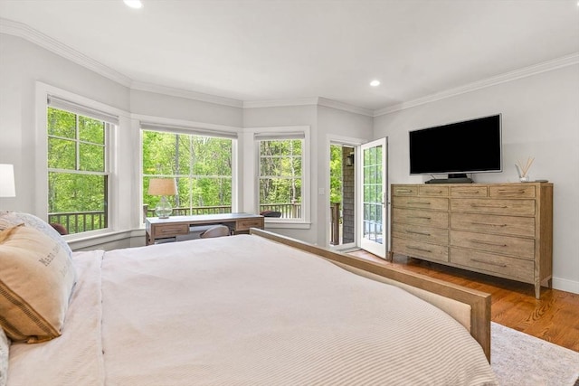29 Flat Pond Cir, Mashpee, MA 02649 - bedroom with wood finished floors, access to exterior, multiple windows, crown molding, and recessed lighting