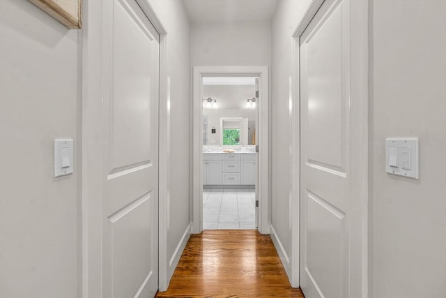 29 Flat Pond Cir, Mashpee, MA 02649 - hallway featuring wood finished floors