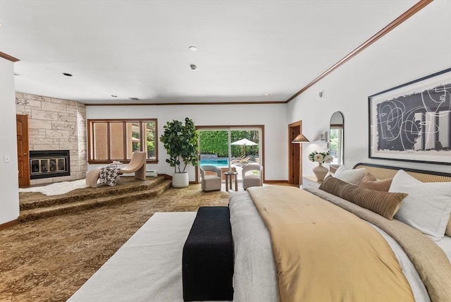81 Countryside Ln, Milton, MA 02186 - bedroom with access to outside, ornamental molding, a stone fireplace, a baseboard radiator, and baseboards