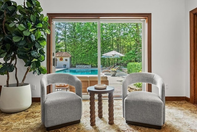 81 Countryside Ln, Milton, MA 02186 - living area with baseboards and healthy amount of natural light