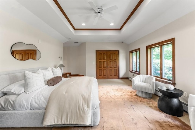 81 Countryside Ln, Milton, MA 02186 - bedroom with recessed lighting, a tray ceiling, baseboards, a baseboard radiator, and a closet