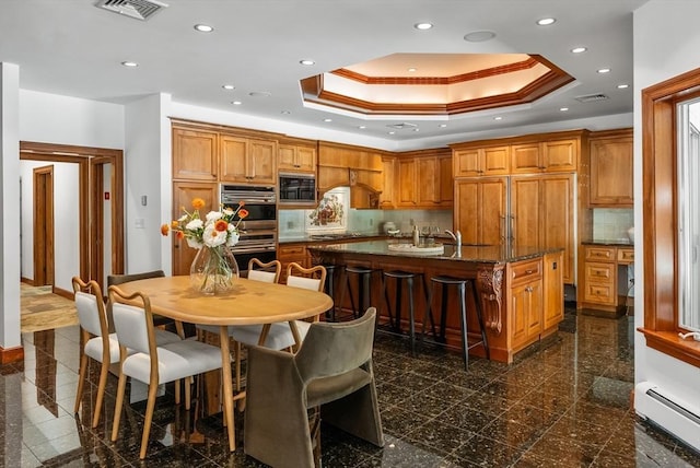 81 Countryside Ln, Milton, MA 02186 - kitchen featuring baseboard heating, stainless steel appliances, ornamental molding, granite floors, and recessed lighting