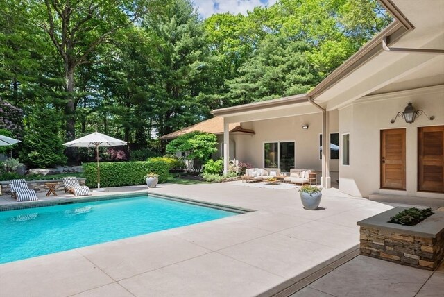 81 Countryside Ln, Milton, MA 02186 - swimming pool featuring a patio area and an outdoor living space