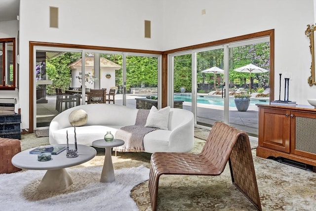 81 Countryside Ln, Milton, MA 02186 - living area with healthy amount of natural light and a towering ceiling