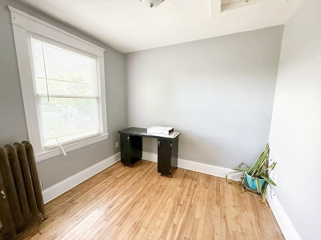 15 Circuit Ave E, Worcester, MA 01603 - unfurnished office featuring radiator, light wood-type flooring, and baseboards