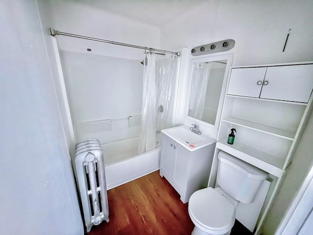 15 Circuit Ave E, Worcester, MA 01603 - full bath featuring radiator, toilet, shower / bath combo, wood finished floors, and vanity